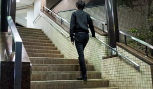 man climbing stairs